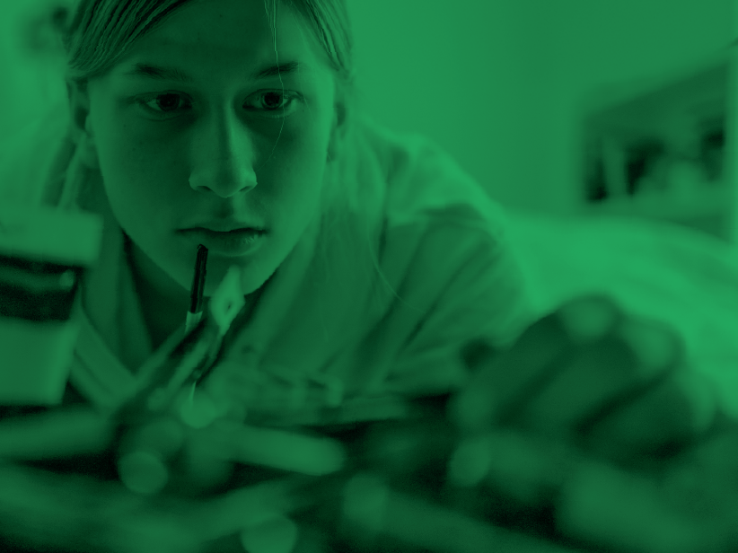 Person examining objects closely.